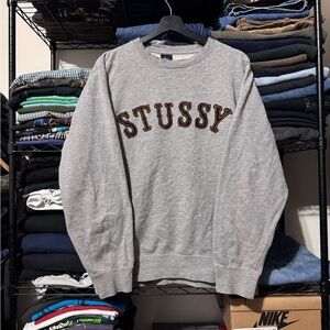 Stussy Gray Crewneck Sweater with Brown Lettering